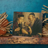 フィクラ類を少年の腕に結ぶラビ フォトプラーク (側面)