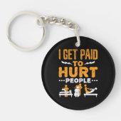 フィジカルセラピーが人を傷つけると給料が上がる キーホルダー (正面)