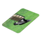 フィーダーマグネット上のダウンしたウッドペッカー マグネット (左側)