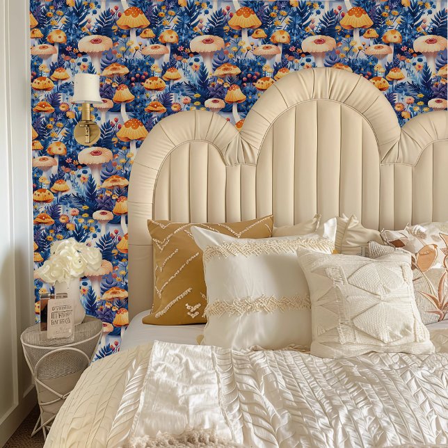フェアリーコアお洒落ラージブルー&オレンジマッシュルーム 壁紙 (Fairycore Whimsical Large Blue & Orange Mushrooms Wallpaper behind a cream colored headboard.)