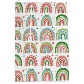 フェスティバルのモダンクリスマスレインボーパターン ミディアムペーパーバッグ (裏面)