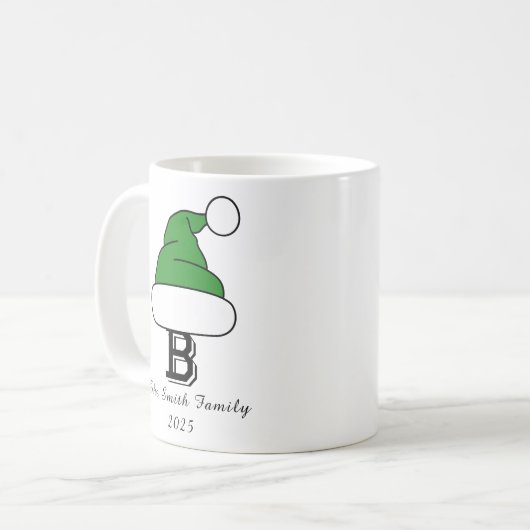 フェスティバルグリーンサンタハットモノグラムファミリークリスマス コーヒーマグカップ (正面左)