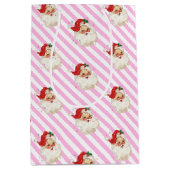 フェスティバルストライプピンクレトロサンタクリスマス ミディアムペーパーバッグ (正面)