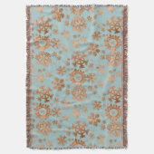 フェスティバルスノーフレークモノグラムのブルーコッパー・ブラウン スローブランケット (正面縦)