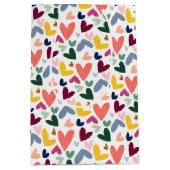 フェスティバルレッドピーチ赤面ピンクブルーハートパターン ミディアムペーパーバッグ (正面)