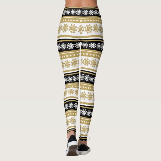 フェスティバル金ゴールド黒クリスマスの雪片模様 レギンス (裏面)