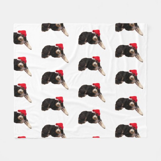フェスティバル&サンタハットを着たかわいいベルネドードル フリースブランケット (正面(横))
