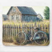フェンス上の捨てられた古い素朴自転車 マウスパッド (正面)
