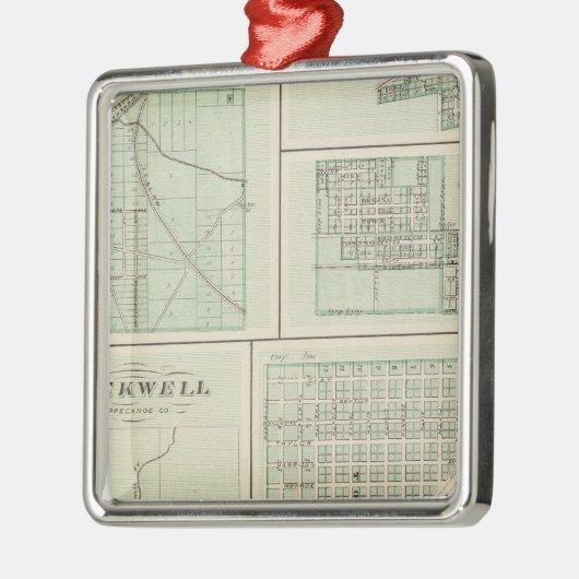 フォウ企業のラーの町、ベントン メタルオーナメント (左)