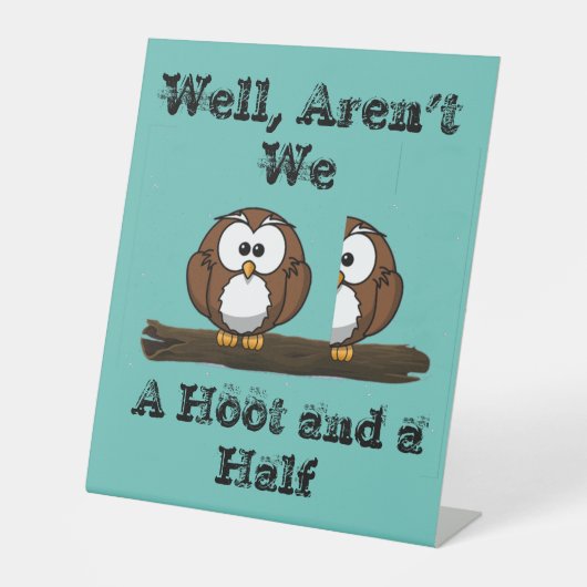 フクロウが鳴き声を上げて商売に 台座サイン (正面)