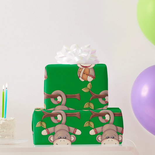 フットボールを持っているサル ラッピングペーパー