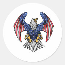 フラッグ飛んでいるウイング付きアメリカンハゲのワシـ