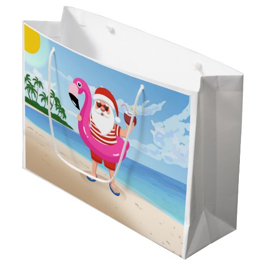 フラミンゴの膨張可能なリングを持つサンタクロース ラージペーパーバッグ (正面アングル)