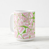 フラワーパワー1ピンク、緑、オレンジ、茶色のアクセント コーヒーマグカップ (正面左)