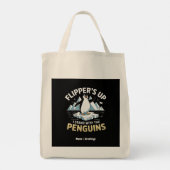 フリッおもしろいパーを上げ、ペンギンと共に立つはっきりした トートバッグ (裏面)