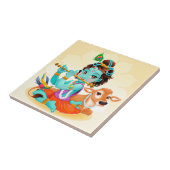 フルートのイラストレーションを遊んでいるKrishnaのインドの神 タイル (側面)