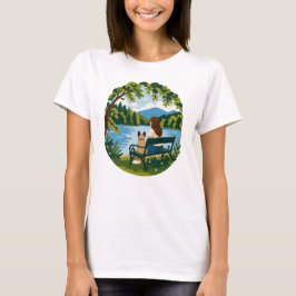フレンチブルドッグと飼い主の静かな湖畔のベンチの情景 Tシャツ
