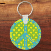 フレームで泳ぐ平和サイン キーホルダー (正面)