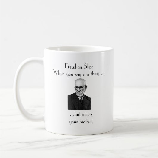フロイト派のスリップ: 1つの事を…言う時 コーヒーマグカップ (左)