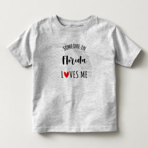 フロリダの誰かが私を愛しているマップベビーTシャツ トドラーTシャツ