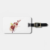 フローラは赤い花とハミングバードで渦巻く ラゲッジタグ (正面横)