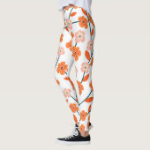 フローラオレンジパステルホワイトシームレス レギンス (左)