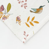 フローラカラフルの背景にある鳥 フリースブランケット (角)