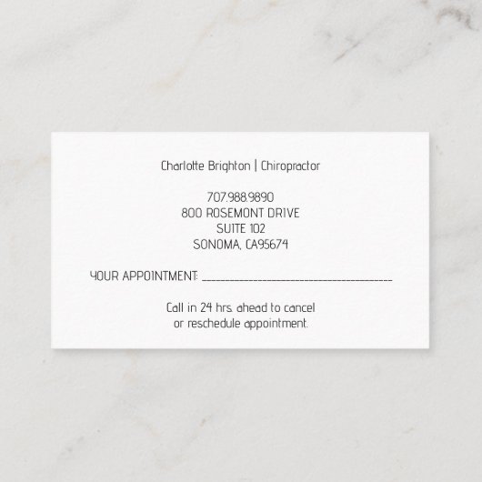 フローラスケルトンカイロプラクターブラックアポイントメントと 名刺 (裏面)