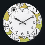 フローラファンキー装飾壁時計 ラージ壁時計<br><div class="desc">フローラコンテンポラリー装飾壁時計は、フローラデザインに配置された白黒の花を特徴ファンキーとする。背景はオレンジ色のハーフトーンパターンを持つ黄色の緑。</div>