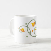 フローラ渦巻きパターン(オレンジと黄色の花) コーヒーマグカップ (正面左)