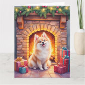 フワフワのポメラニアンとあたたかなクリスマスの暖炉の犬の芸術 カード (正面)