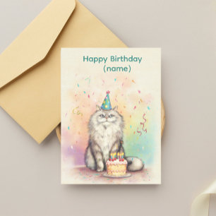 フワフワの誕生日猫 – パーティー帽の猫とケーキ ポストカード