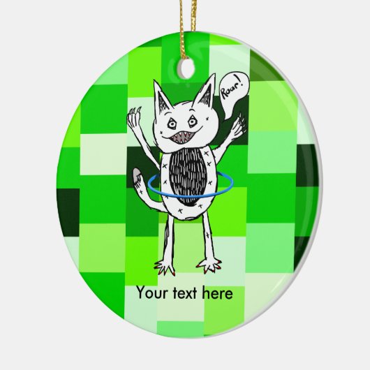 フープ遊付きのおもしろいを持つ怪物 セラミックオーナメント (左)