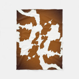 ブラウンおよび白い牛プリントパターン フリースブランケット