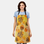 ブラウンと離れ金ゴールドの大きなモンステラの エプロン (着用した状態)