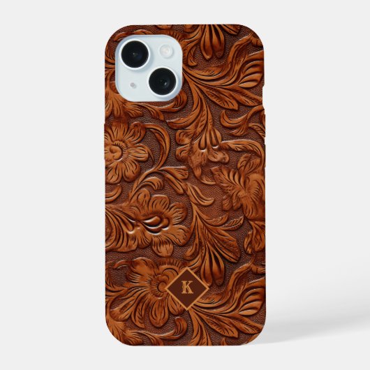 ブラウンの立体型押し革の花柄に2つのモノグラム iPhone 15ケース (裏面)