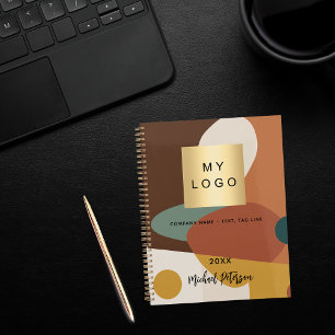 ブラウンオレンジ色のレトロパターンのビジネスロゴ ノートブック
