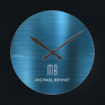 ブラッエレガントシュモノグラムのドメタリックブルー ラウンド壁時計<br><div class="desc">エレガントパーソナライズされたモノグラムのは金属性の青い丸い時計。</div>