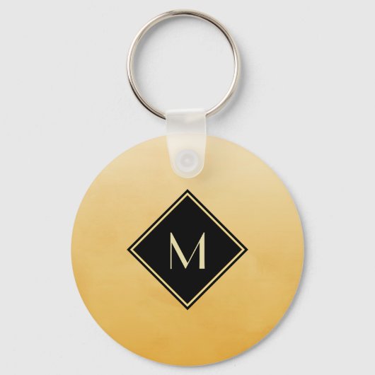 ブラッエレガントシュ黄色の金ゴールドモノグラム キーホルダー (正面)