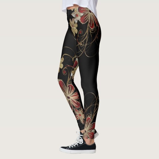 ブラックとプリント全体の金ゴールドグリッターフローラ レギンス (左)