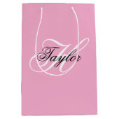 ブラックとホワイトのファンシーなモノグラム ピンク ミディアムペーパーバッグ (正面)