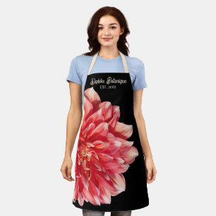 ブラックの背景にコーラルレッドのダリアの花をあしらった、美しいクラシックなキッチンエプロン。お店の名 エプロン