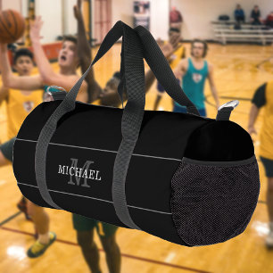 ブラックエレガントシルバーモノグラム名前をカスタムする ダッフルバッグ