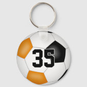 ブラックオレンジ色のサッカーチームの女の子をプレゼント キーホルダー (裏面)
