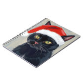 ブラックキャット | クリスマスの絵画 サンタの帽子 ノートブック (左側)