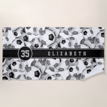 ブラックグレーのチームカラーのサッカーボールのパターンの子供