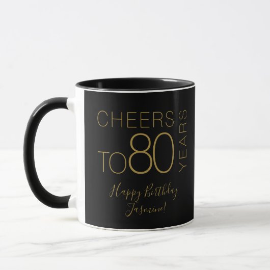 ブラックゴールドで80歳の誕生日をお祝い マグカップ (左)