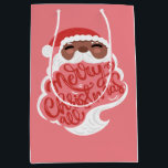 ブラックサンタ | Merry Christmas All、ピンク ミディアムペーパーバッグ<br><div class="desc">キラキラとメリークリスマスピンクの背景の全レタリング</div>