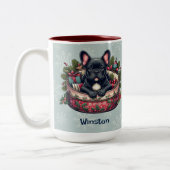 ブラックフレンチー、ホリデーベッド、スノーフレークの背景 ツートーンマグカップ (左)