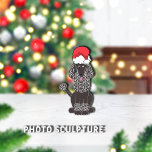 ブラックプードルクリスマスペットオーナメント 写真彫刻オーナメント<br><div class="desc">赤いサンタクロースの帽子をかぶった可愛らしい黒いスタンダードプードル。愛らしい目とピンクの舌を出す。Dog Graphic by: Lori@SaltTownStudio.</div>